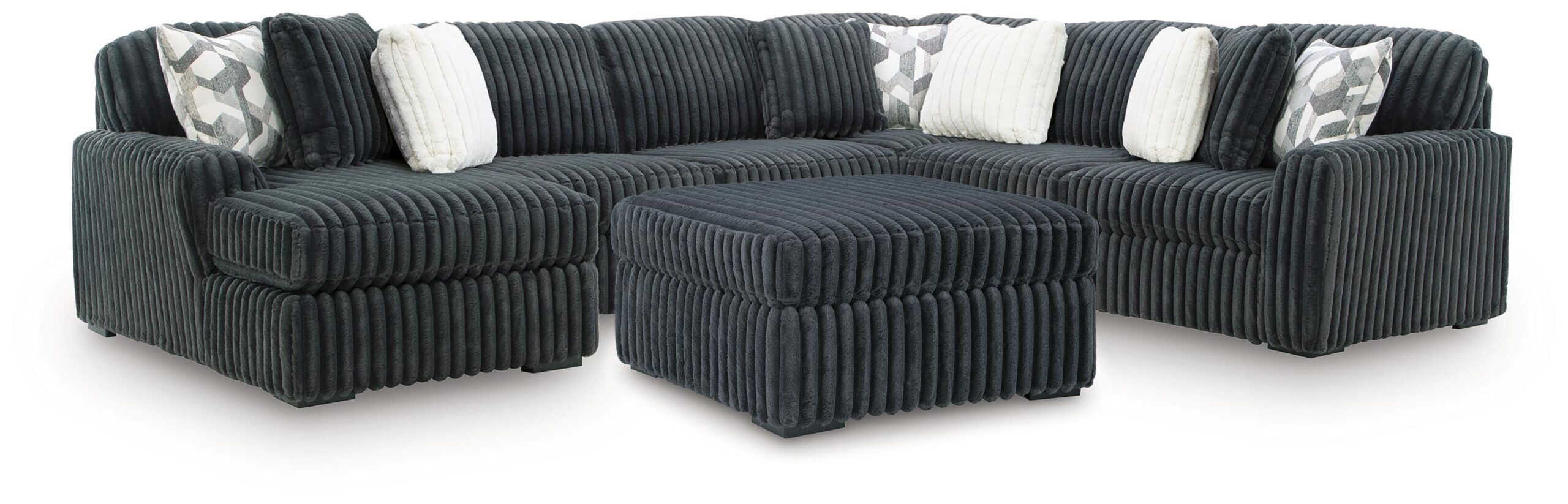 73ead19b4ff4ebd406adc707053d9f73 Midnight-Madness 4-Piece Sectional and Ottoman - Image 1