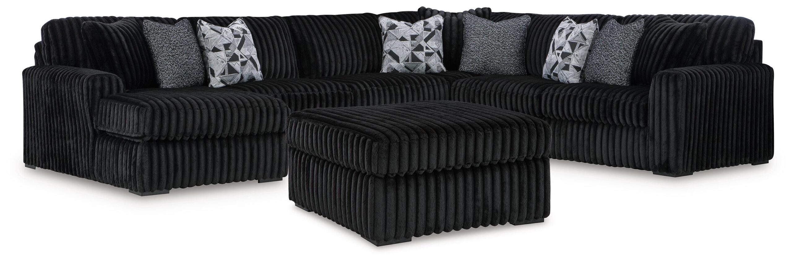 74f2d44ddc9d5baa844c37f774103d49 Midnight-Madness 4-Piece Sectional and Ottoman - Image 1
