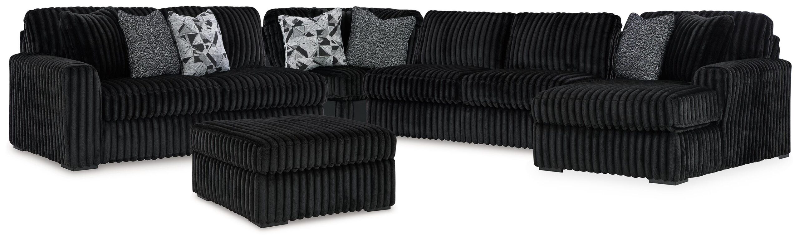 ae3de88fb03389de3474bd54357d21f5 Midnight-Madness 4-Piece Sectional and Oversized Accent Ottoman - Image 1