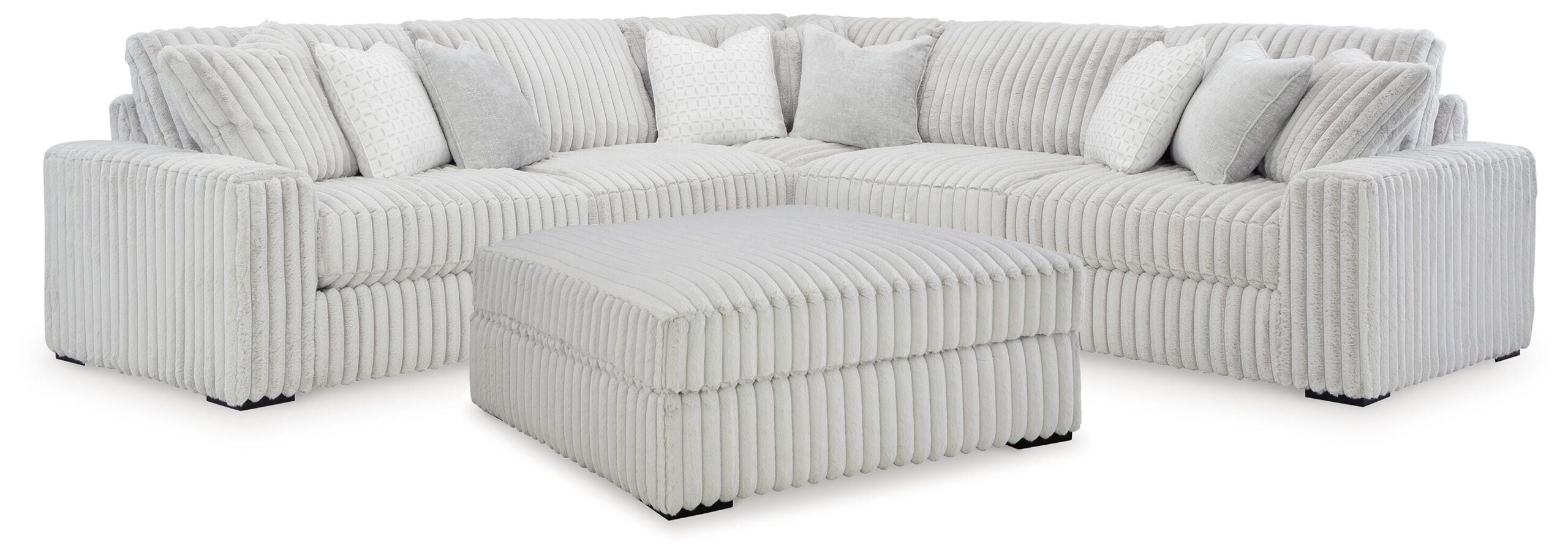 bbb9cc6935f8f76f117698f26b0b3ffb Stupendous 3-Piece Sectional and Ottoman - Image 1